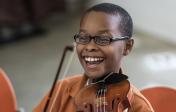 Young boy with violin