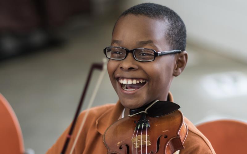 Young boy with violin